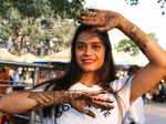 New Delhi: A married woman shows her hands after applying henna on the eve of Karwa Chauth festival, in New Delhi on Wednesday, Oct. 12, 2022. (Photo: Wasim Sarvar/IANS)