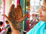 Haridwar: A married woman shows her hands after getting henna done ahead of Karwa Chauth festival in Haridwar on Wednesday, Oct. 10, 2022. (Photo: Rameshwar Gaur/IANS)