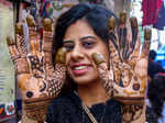 Gurugram: A women shows her hands adorned with 'mehndi' on the eve of Karwa Chau...