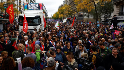 Thousands take to the streets of Paris to protest soaring prices ...