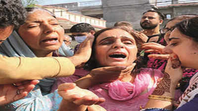 Emotional scenes at cremation of slain Kashmiri pandit in Jammu