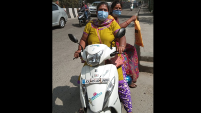 Bengaluru: Woman hit by bus after falling from scooter on pothole ...