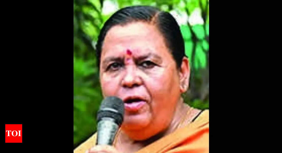 uma-bharti-tears-banner-of-liquor-shop-near-temple-in-bhopal-or-bhopal-news-times-of-india