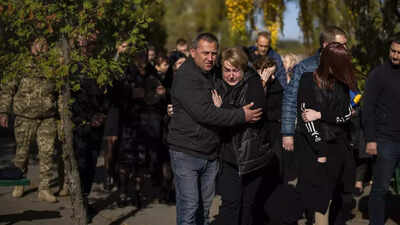 Divided loyalties in Ukraine city as Russia presses assault