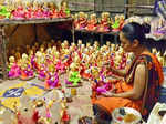 Nagpur : Artist giving final touch to the idols of Goddess Laxmi ahead of Diwali festival in Nagpur on Wednesday, October 19, 2022. (Photo:Chandrakant Paddhane/IANS)