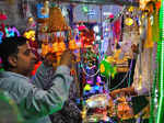 Amritsar: A man shops at a market ahead of the Diwali festival, in Amritsar. (PT...