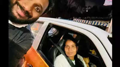 Cabbie mother carries baby along on duty, wins hearts