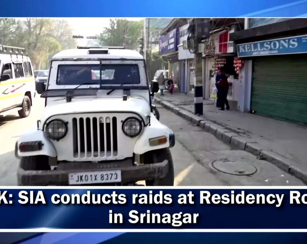 
J&K: SIA conducts raids at Residency Road in Srinagar
