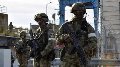 Russia hits Ukraine homes, evacuates Kherson, warns of escalation