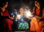 Thiruvananthapuram, Oct 23 (ANI): People light sparklers as part of Diwali celeb...