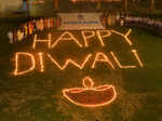 Patiala: Earthen lamps lit by students during celebrations of the Diwali festiva...