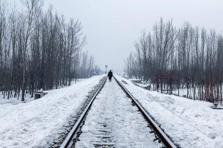 Snow covered Banihal-Baramullah train track