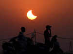 Bhopal, Oct 25 (ANI): Partial solar eclipse is witnessed in the sky, in Bhopal o...