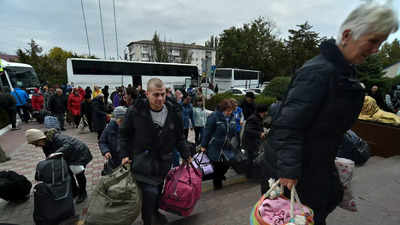 Ukraine: Evacuations intensify in Kherson; power sites hit