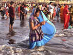 Mumbai: Devotees offer prayers to the sun during Chhath Puja festival, at Juhu C...