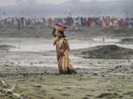 Noida: A devotee during 'Chhath Puja' festivities at Kalindi Kunj in Noida. (PTI...