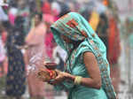 Ghaziabad: A devotee performs rituals of 'Chhath Puja' at Hindon river in Ghazia...