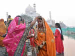 Agra, Oct 30 (ANI): A vermilion being applied to a devotee during Chhath Puja fe...