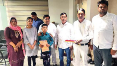 Uttar Pradesh CM Yogi Adityanath meets boy who was kidnapped, pats police team