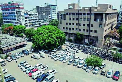 Move to allot 4 parking sites to contractor raises questions