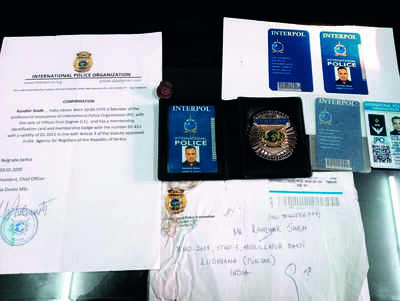 Wrong sticker does fake interpol officer in