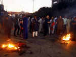 Supporters of Pakistan former Prime Minister Imran Khan, protest following the shooting incident on his long march in Wazirabad, in Karachi,