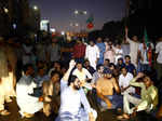 Supporters of Pakistan former Prime Minister Imran Khan, protest following the shooting incident on his long march in Wazirabad, in Karachi,