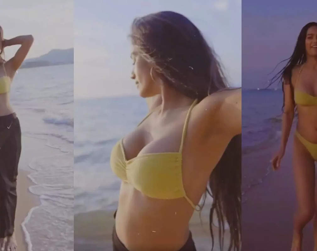 
‘GETTING HOT’: Poonam Pandey crosses all limits of boldness as she runs on the beach wearing bikini
