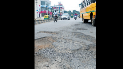Bengaluru's pothole-riddled roads give citizens a backache