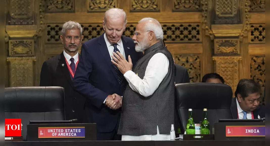 G20 Summit: PM Modi, US President Biden share warm hug at Bali | India News – Times of India