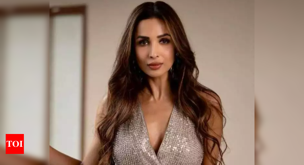 Malaika Arora tries new form of workout, urges everyone to follow suit to keep fit – Times of India
