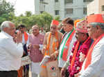 Anand, Nov 15 (ANI): Gujarat Chief Minister Bhupendra Patel greets Bharatiya Jan...