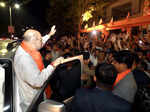 Gandhinagar, Nov 14 (ANI): Union Home Minister Amit Shah waves to the Bharatiya ...