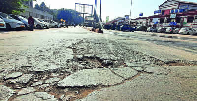 Potholes, open drains welcome passengers outside Doon rly stn