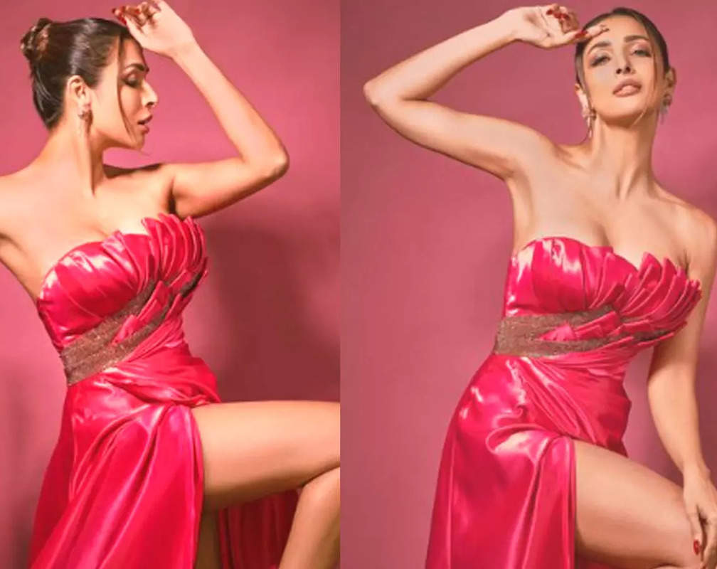 
Malaika Arora stuns fans in a pink satin dress with thigh-high slit; netizens say 'Ab buddhi ho gayi ho'

