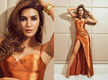 
Kriti Sanon slays in a thigh high slit copper dress
