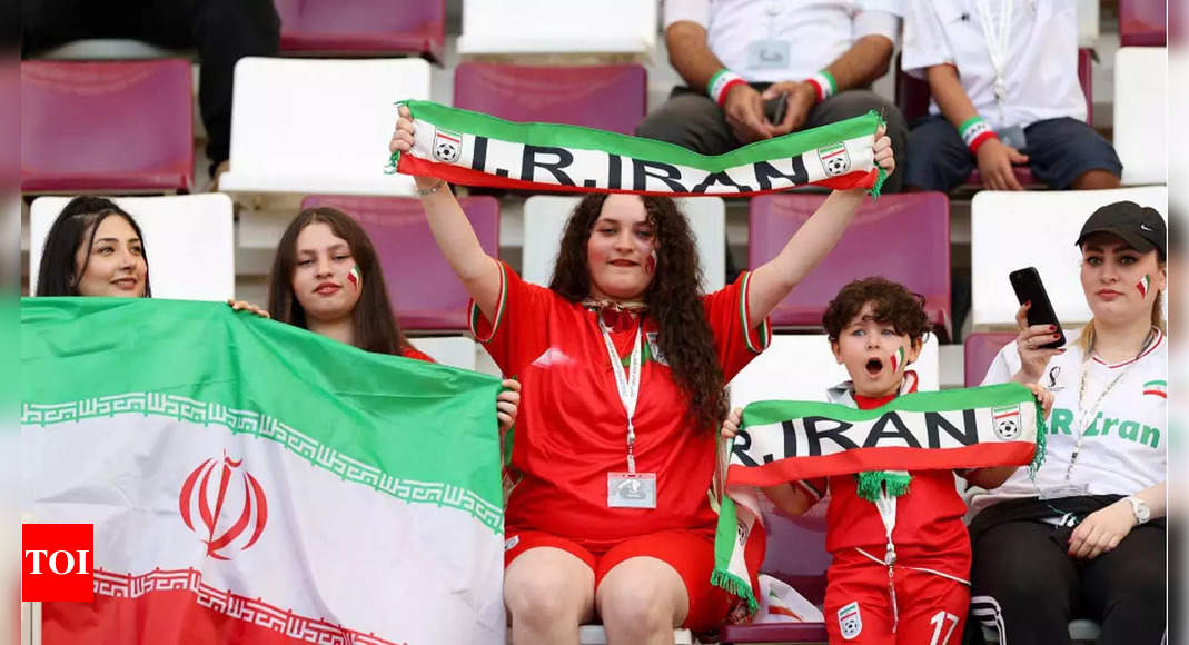 Barred from stadiums at home, Iran women travel to FIFA World Cup | Football News – Times of India