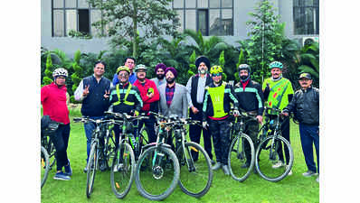 City bizmen honour UP cycling group