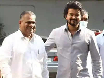 Thalapathy Vijay warns the secretary of his fan club, Bussy Anand, as fans touch the feet of the latter