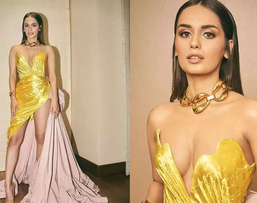 
Manushi Chhillar turns into a 'Princess' as she flaunts her glamorous look in strapless structured golden gown with plunging neckline
