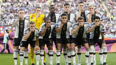 German football team players' silent protest - Cover mouths in team photo amid armband row