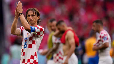 Modric says first get through the group, then more for Croatia