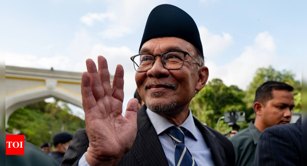 Long-time reformist leader Anwar sworn in as Malaysian PM – Times of India