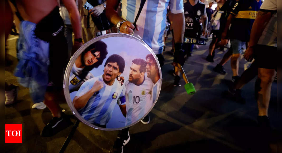 Watch: Argentina fans pray for Maradona magic at World Cup amid tributes | Football News – Times of India