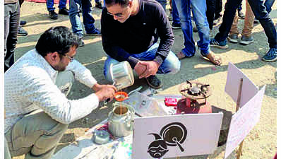 On Day 24, HEC execs sell tea at protest site