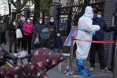 Anti-lockdown protests intensify in China as Covid cases hit record high