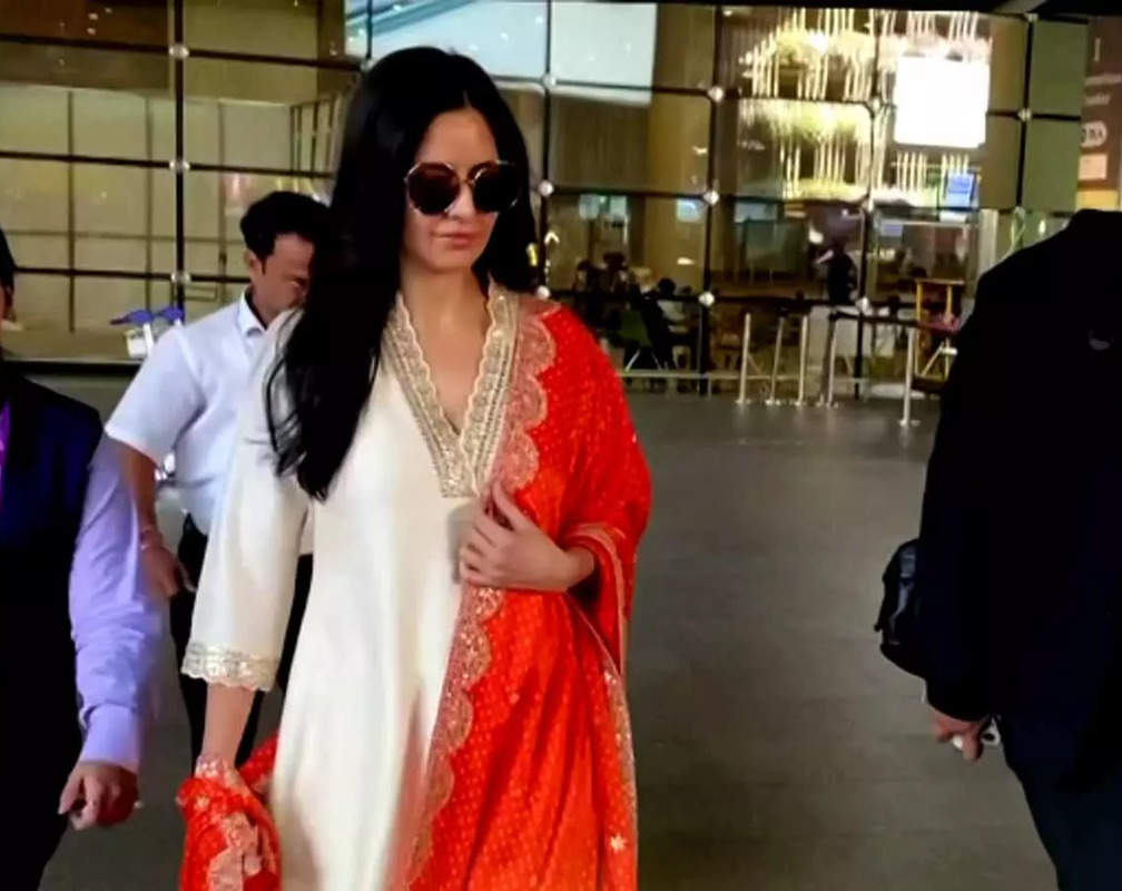 
Katrina Kaif looks heavenly gorgeous in ivory kurta, pairs it with orange dupatta and sunglasses
