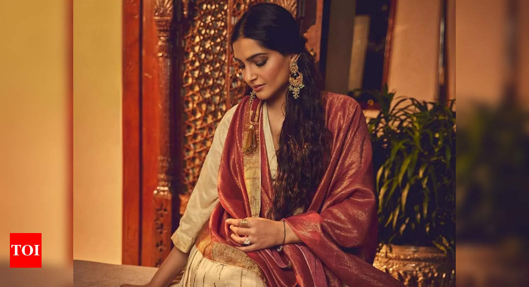 Sonam Kapoor looks gorgeous as she steps out in a yellow traditional outfit and gajra – Watch video – Times of India