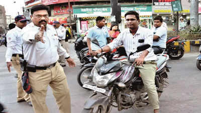 Nashik: Traffic police relaunch helmet-checking drive to ensure safety of motorcyclists