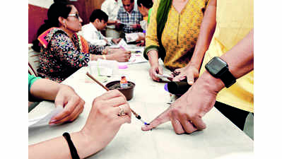 Surat polling figures revised, up by .52%